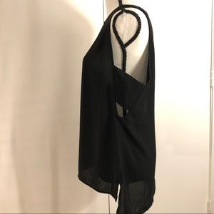 Trouvé Tank with Cut Outs